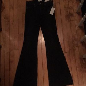 Washed black flare leg jeans, size 31. NWT